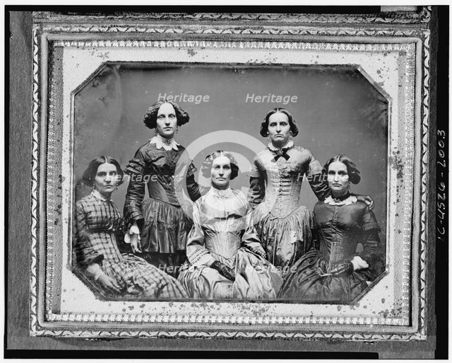 Clark sisters, five women, three-quarter length portraits, all facing front, between 1840 and 1860. Creator: Unknown.
