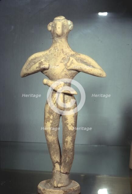 Clay Votive Figurine of Man wearing Belt and Dagger, Proto-Palatial Period, 2000BC-1700 BC.  Artist: Unknown.