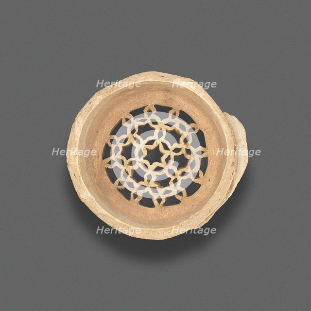 Clay filter with geometric design, Fatimid dynasty (969-1171), 11th-12th century. Creator: Unknown.