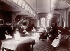 Claybury Asylum, Woodford, Essex: a nurses day-room (?), (1893?). Creator: London & County Photographic Co