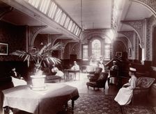 Claybury Asylum, Woodford, Essex: a nurses day-room (?), (1893?). Creator: London & County Photographic Co