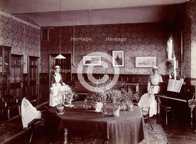 Claybury Asylum, Woodford, Essex: a social room (?) , [1893?]. Creator: London & County Photographic Co.