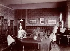Claybury Asylum, Woodford, Essex: a social room (?) , [1893?]. Creator: London & County Photographic Co
