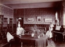 Claybury Asylum, Woodford, Essex: a social room (?) , [1893?]. Creator: London & County Photographic Co