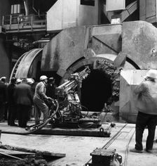 Cleaning a Kaldo furnace, Park Gate Iron & Steel Co, Rotherham, South Yorkshire, 1964. Creator: Michael Walters