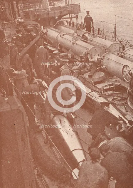 Cleaning and adjusting torpedoes, c1917 (1919). Artist: Unknown.