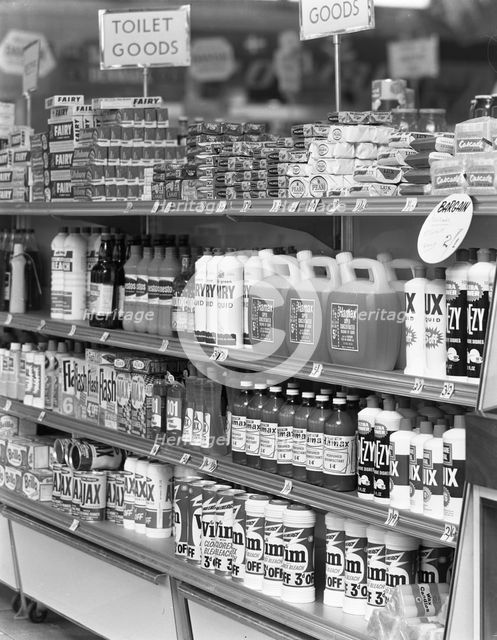 Cleaning products on supermarket shelves, 1966. Creator: Michael Walters.