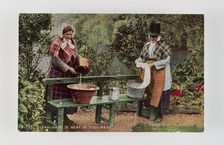 "Cleanliness is next to Godliness". Women in Welsh costume washing in tubs on bench, c1900s Creator: Unknown