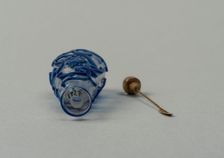 Clear glass snuff bottle with blue overlay, China, Qing dynasty, 1644-1911. Creator: Unknown