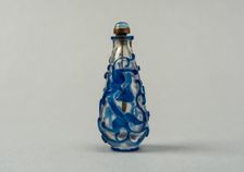 Clear glass snuff bottle with blue overlay, China, Qing dynasty, 1644-1911. Creator: Unknown