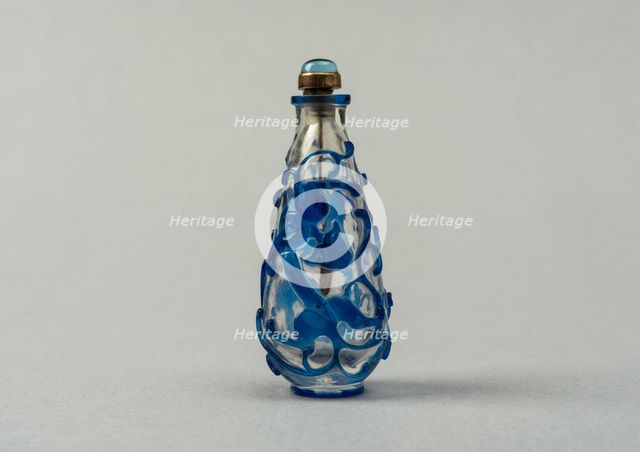 Clear glass snuff bottle with blue overlay, China, Qing dynasty, 1644-1911. Creator: Unknown.