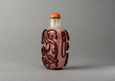 Clear glass snuff bottle with red overlay, China, Qing dynasty, 1644-1911. Creator: Unknown