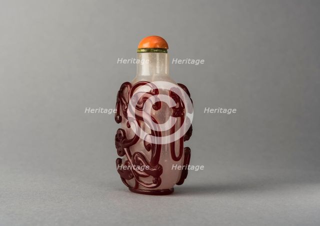 Clear glass snuff bottle with red overlay, China, Qing dynasty, 1644-1911. Creator: Unknown.