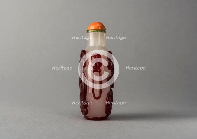 Clear glass snuff bottle with red overlay, China, Qing dynasty, 1644-1911. Creator: Unknown.