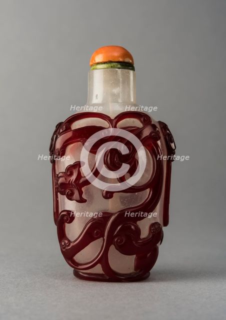 Clear glass snuff bottle with red overlay, China, Qing dynasty, 1644-1911. Creator: Unknown.