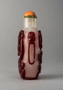 Clear glass snuff bottle with red overlay, China, Qing dynasty, 1644-1911. Creator: Unknown