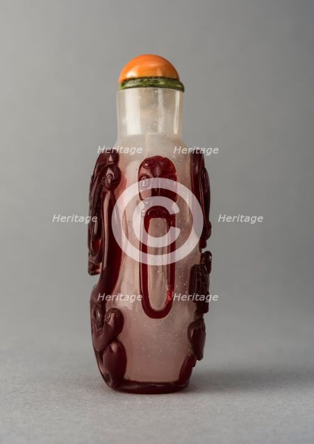 Clear glass snuff bottle with red overlay, China, Qing dynasty, 1644-1911. Creator: Unknown.