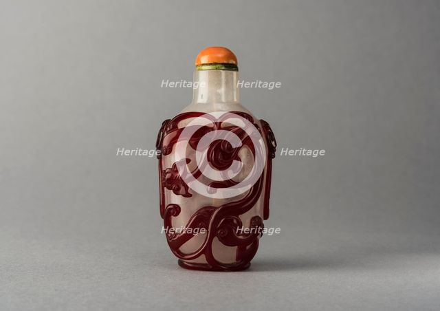 Clear glass snuff bottle with red overlay, China, Qing dynasty, 1644-1911. Creator: Unknown.