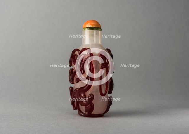 Clear glass snuff bottle with red overlay, China, Qing dynasty, 1644-1911. Creator: Unknown.