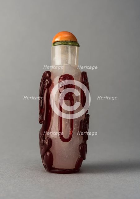 Clear glass snuff bottle with red overlay, China, Qing dynasty, 1644-1911. Creator: Unknown.