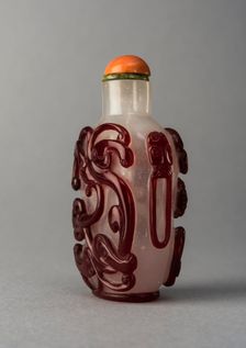 Clear glass snuff bottle with red overlay, China, Qing dynasty, 1644-1911. Creator: Unknown