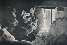 Clearing Drift from Window of Hut at Cape Adare c1911, (1913). Artist: G Murray Levick