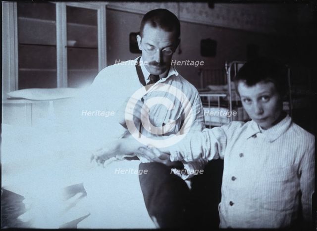 Clemens Peter Pirquet, Freiherr von Cesenatico, and a patient. Creator: Unknown.