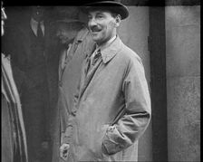 Clement at tlee Standing Outside a Building, 1930s. Creator: British Pathe Ltd