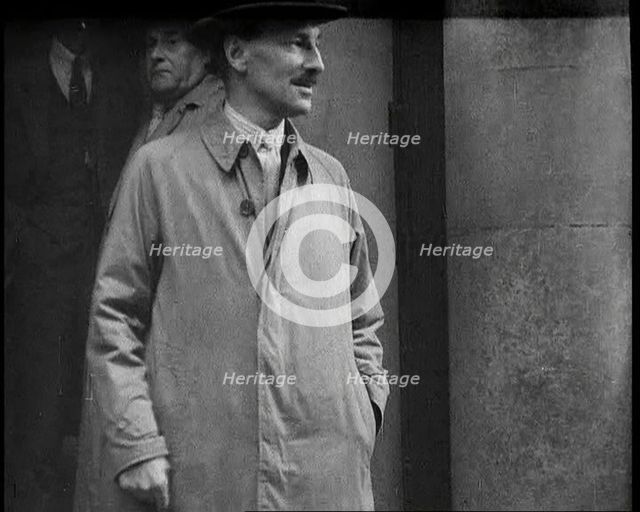 Clement Attlee Standing Outside a Building, 1930s. Creator: British Pathe Ltd.