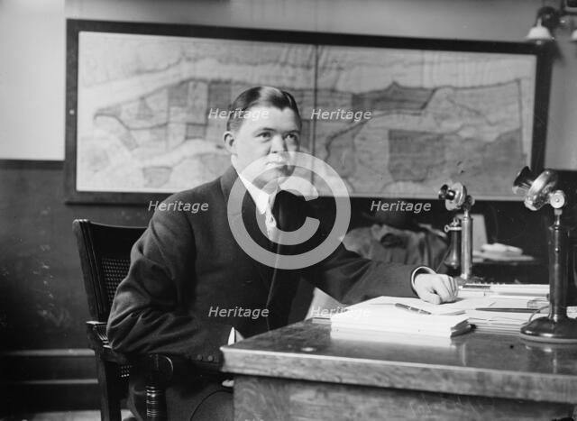 Clement Driscoll seated at desk, 1910. Creator: Bain News Service.