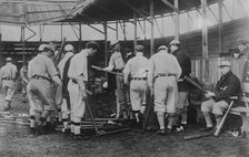 Cleveland [AL] ball players selecting new bats; Graney on bench, 1910. Creator: Bain News Service