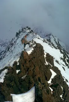 Climber on Crib Goch ridge on Snowdon