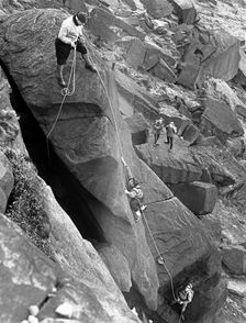 Climbers on Stanage Edge, Hathersage, Derbyshire, 1964. Creator: Michael Walters