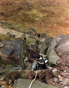 Climbers on Stanage Edge, Hathersage, Derbyshire, 1964. Creator: Michael Walters