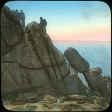 Climbing the Logan Rock, near Treen, Cornwall, late 19th or early 20th century. Artist: Church Army Lantern Department