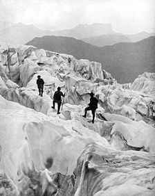 Climbing through the Bossons icefall on the way up Mont Blanc, Switzerland, early 20th century