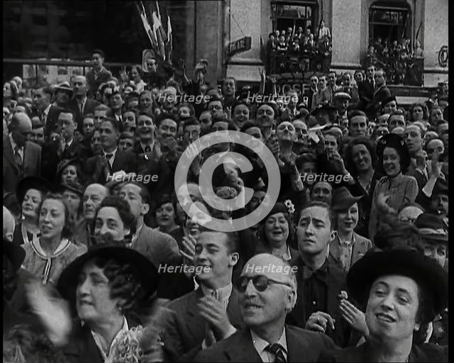 Close up a Section of the Crowd Spectating at  a Bastille Day Military Parade With People..., 1939. Creator: British Pathe Ltd.