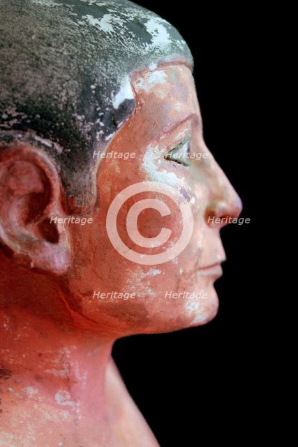Close up of an Egyptian seated scribe model. Artist: Unknown