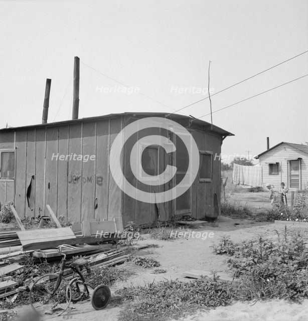 Close-up of present dwelling from which family will move into..., near Yakima, Washington, 1939. Creator: Dorothea Lange.