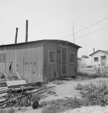 Close-up of present dwelling from which family will move into..., near Yakima, Washington, 1939. Creator: Dorothea Lange