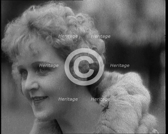 Close up Shot of British Actress Betty Balfour Outdoors Looking at the Distance, 1920. Creator: British Pathe Ltd.
