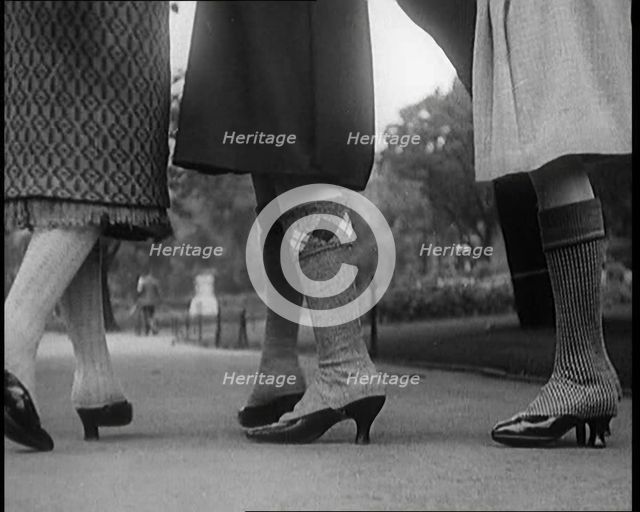Close up Shot of Female Civilians Legs Wearing Wool Stockings, 1920. Creator: British Pathe Ltd.