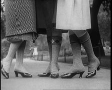 Close up Shot of Female Civilians Legs Wearing Wool Stockings, 1920. Creator: British Pathe Ltd