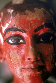 Closeup of head of Tutankhamun as a child emerging from a lotus flower