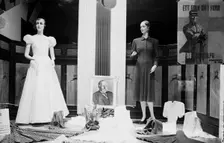 Clothes shop window with rwo mannequins, Malmö, Sweden, 1940. Creator: Unknown