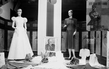 Clothes shop window with rwo mannequins, Malmö, Sweden, 1940. Creator: Unknown