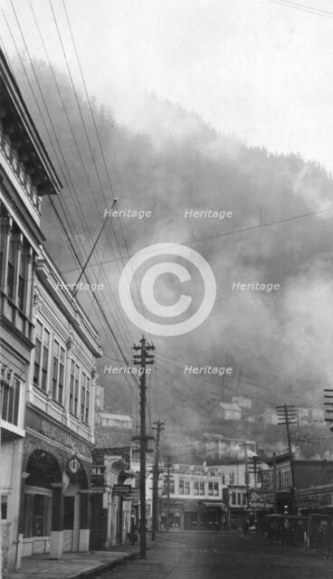 Clouds descending into the main street, between c1900 and 1923. Creator: Unknown.