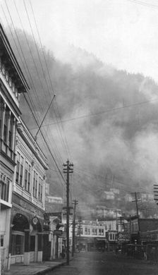 Clouds descending into the main street, between c1900 and 1923. Creator: Unknown