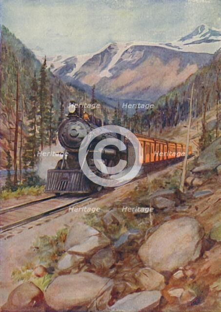 'C.P.R. Train in the Rockies', 1924. Artist: Unknown.