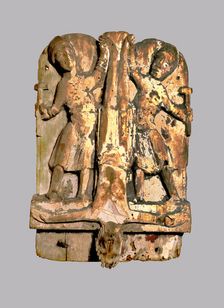 Crucifixion of St. Peter, 12th century carving